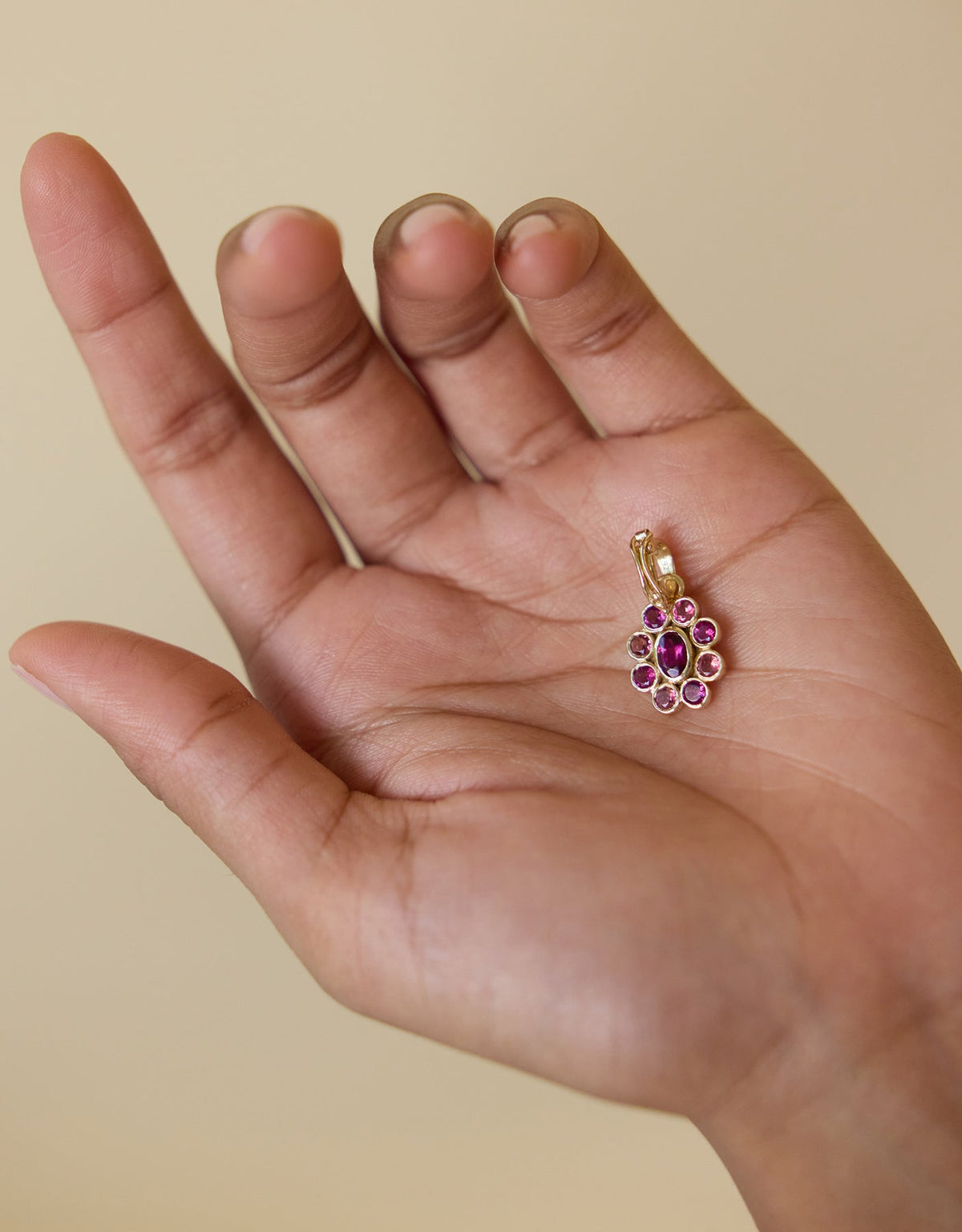 9 Planetes Garnet Charm